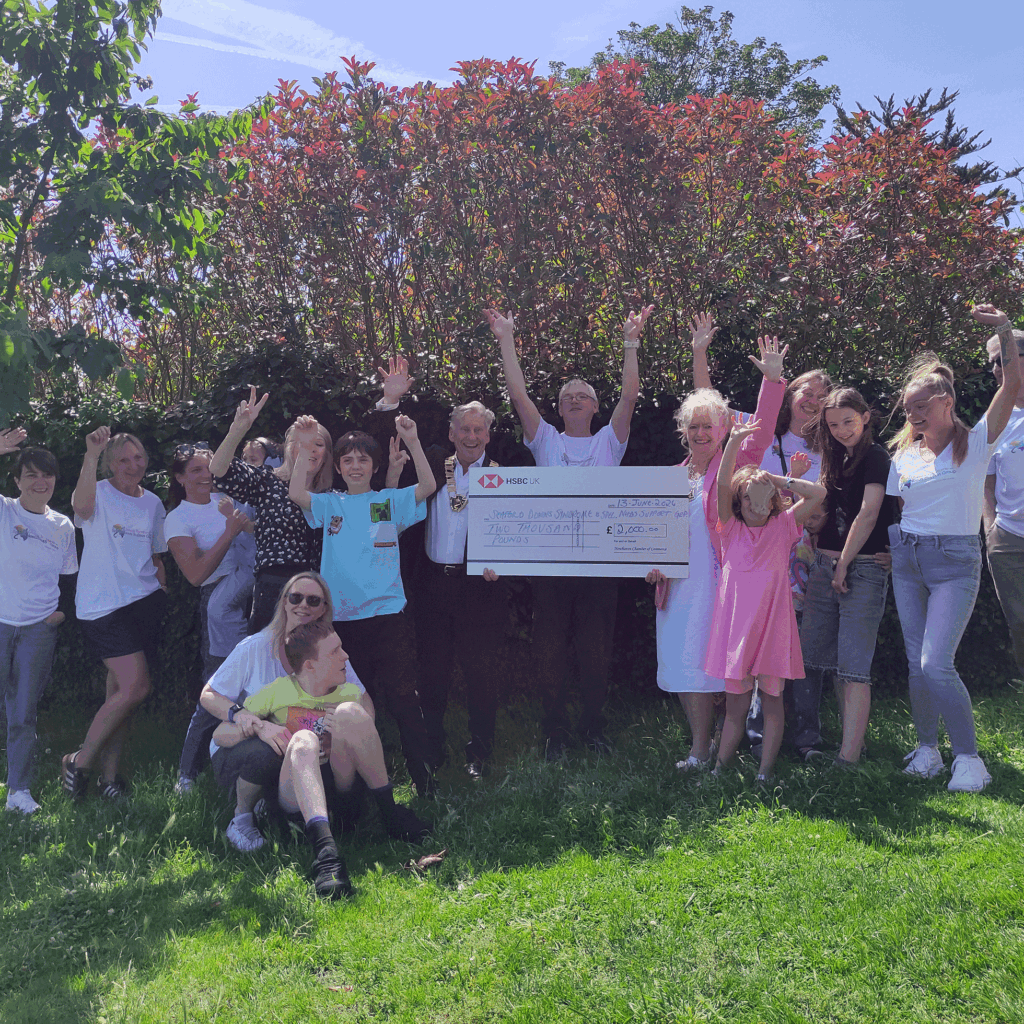 Newhaven Chamber of Commerce Present the Seaford Down's Syndrome and Special Needs Support Group with a cheque for £2,000